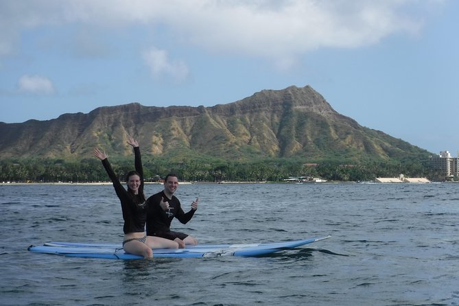 1.5-Hour Semi Private Surfing Lesson in Honolulu - Heading into the water at Waikīkī Beach