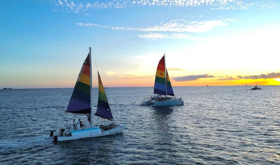 Board from Waikiki Beach: Scenic Sunset Sail on the Hāwea - Boarding behind the Duke Kahanamoku Statue