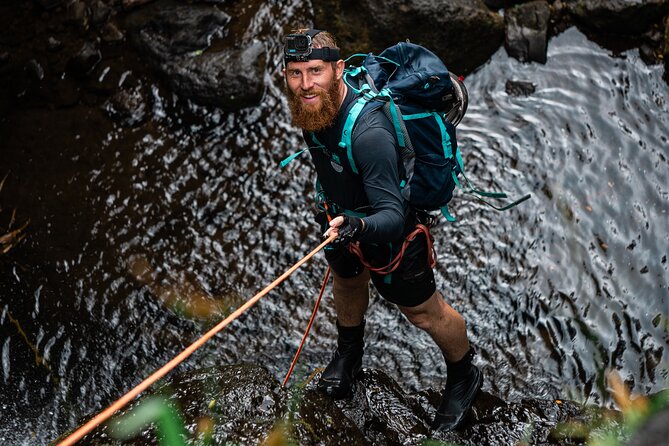 Chasing Waterfalls:Wild Hawaii Rappelling - Rappelling down the falls
