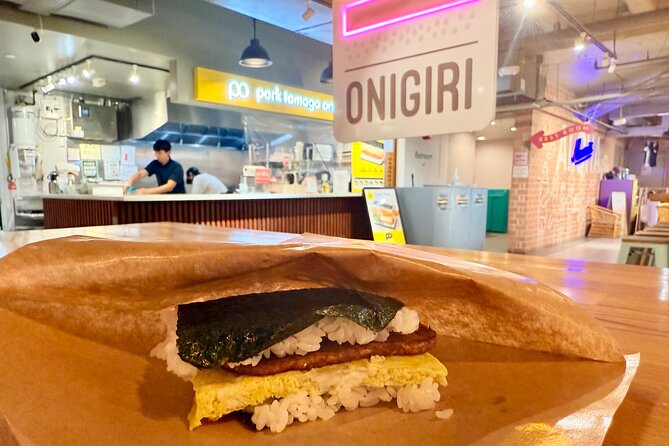 Downtown Honolulu Food Tour with 5 Local Favorites Tastings - Fort DeRussy, the beach, and a defensive past