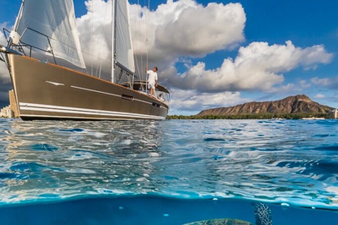 Explore Turtle Canyons Waikiki Snorkel and Sail Adventure - Setting sail near Waikiki
