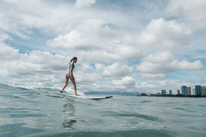 Group Surf Lesson in Honolulu - Catching your first Waikiki wave