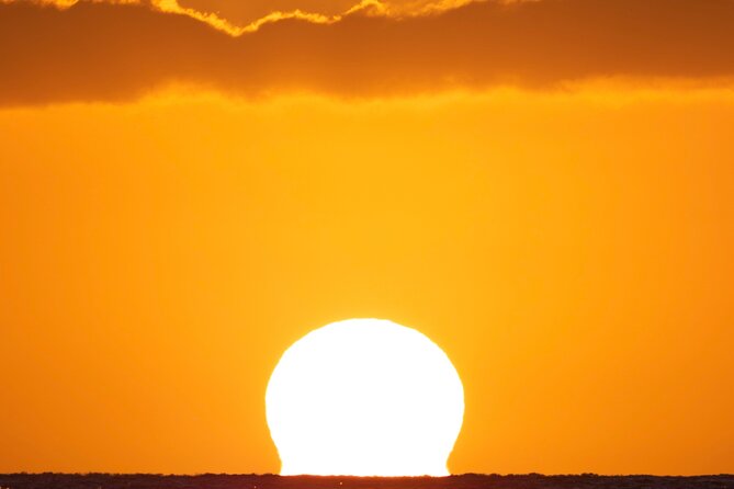Moana’s Luxury semi-private Sunset Cruise on Nalu - Passing Diamond Head from the ocean