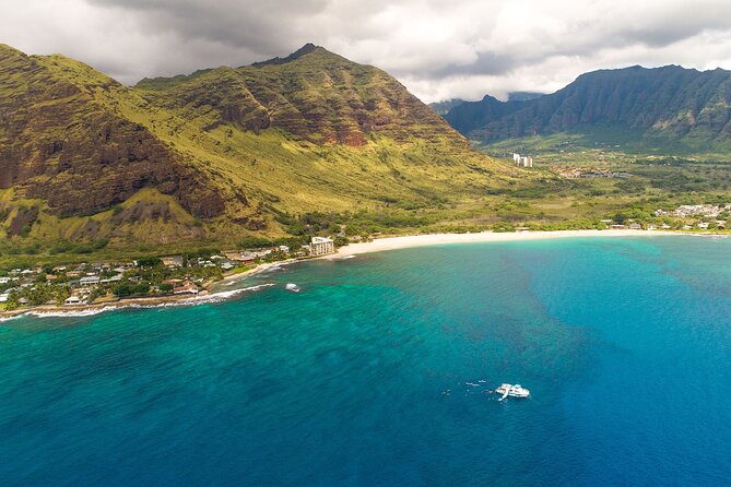 Oahu Dolphin and Snorkel Tour with Waikiki Pickup & Lunch - Photos, seasickness, and what to pack