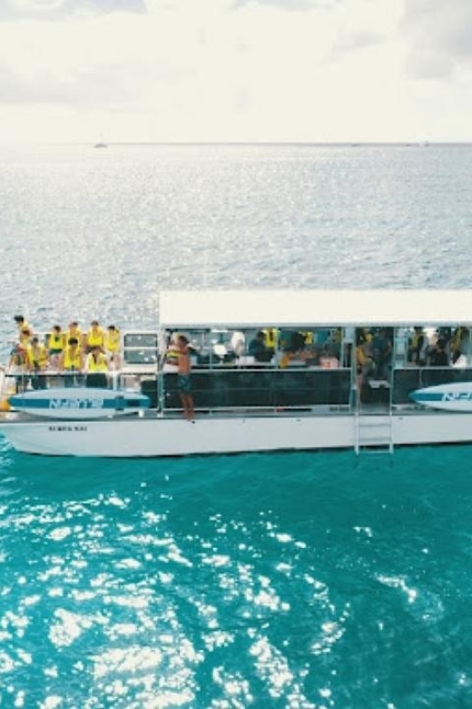 Oahu Snorkeling with Turtles, Water Scooter, Paddleboard - Paddleboarding in open water