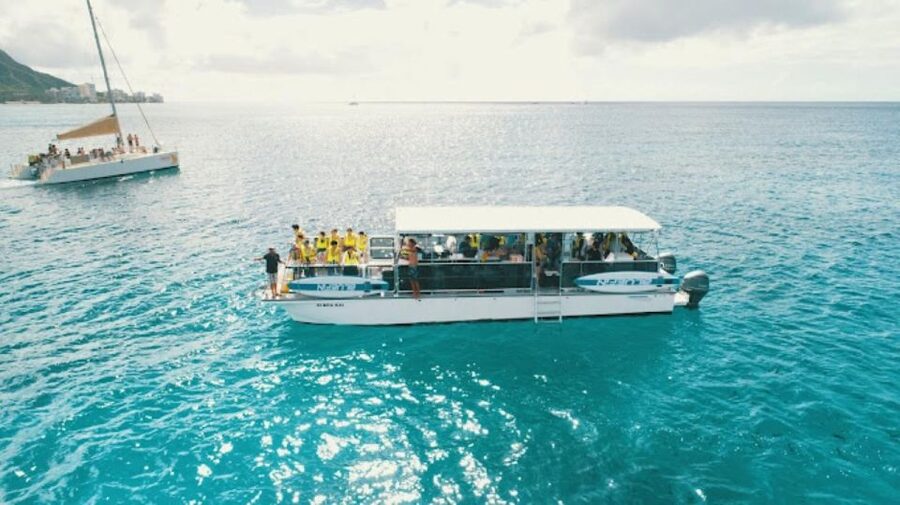 Oahu Snorkeling with Turtles, Water Scooter, Paddleboard - From Waikiki pickup to the catamaran