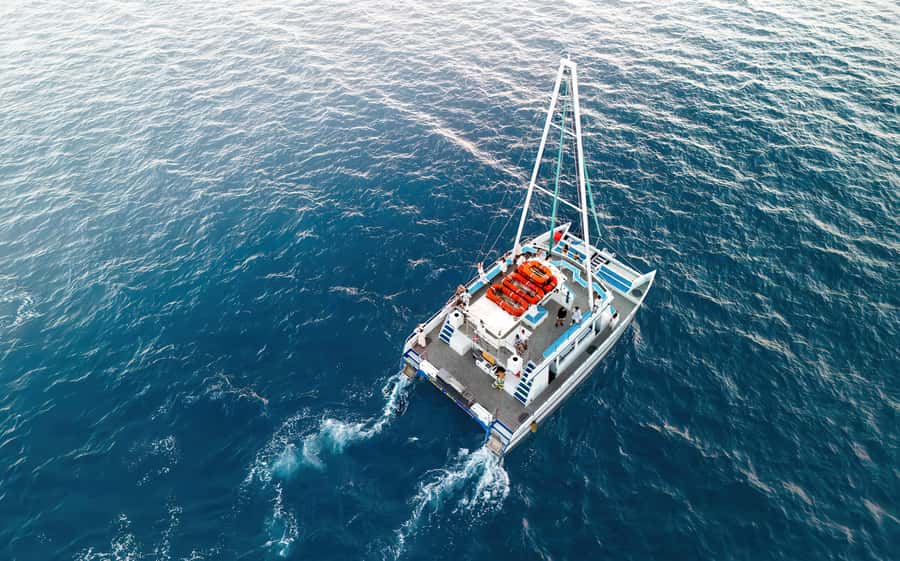Oahu: Sunset Sail Cruise in Waikiki - Getting comfortable on the 55-foot catamaran