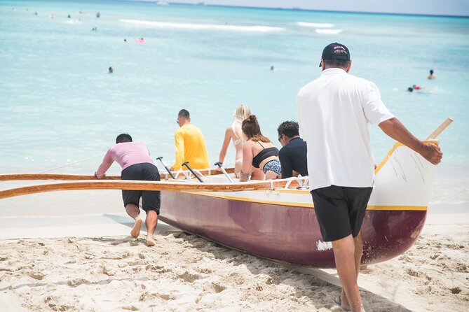 Outrigger Canoe Surfing - Catching two waves with Captain Russell or another licensed captain