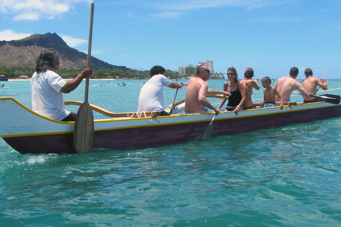 Outrigger Canoe Surfing - Paddling offshore and waiting for the right wave