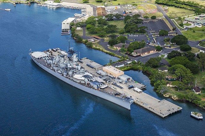 Pearl Harbor, National Memorial Cemetery and Honolulu City Tour - Downtown Honolulu adds a useful Hawaiian history lesson
