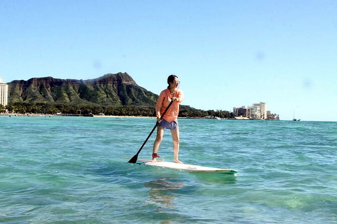 Private Group SUP Lessons by Waikiki Beachboys at the Royal - Paddling close to the instructor