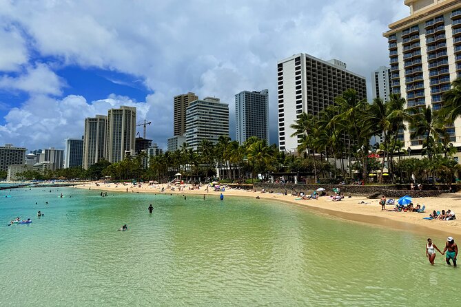 Private Walking Food Tour in Honolulu With Secret Food Tours - Hula and the birthplace of surfing at Kuhio Beach