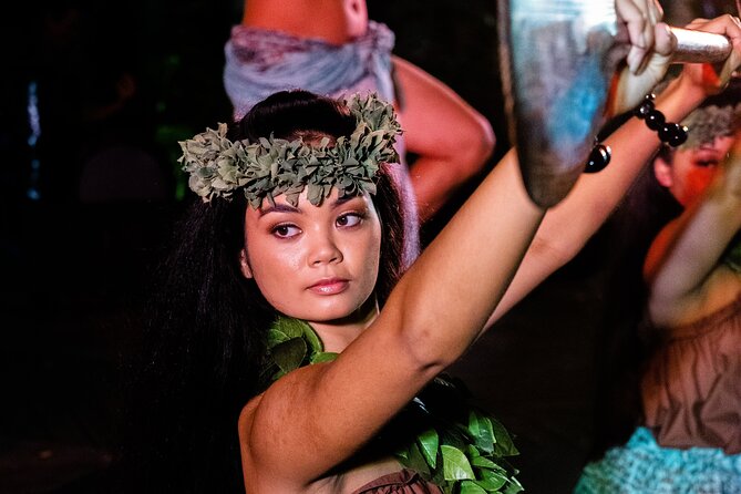 Queens Waikiki Luau with Dinner Buffet and Cultural Activities - Music, island dances, and the fire knife finale