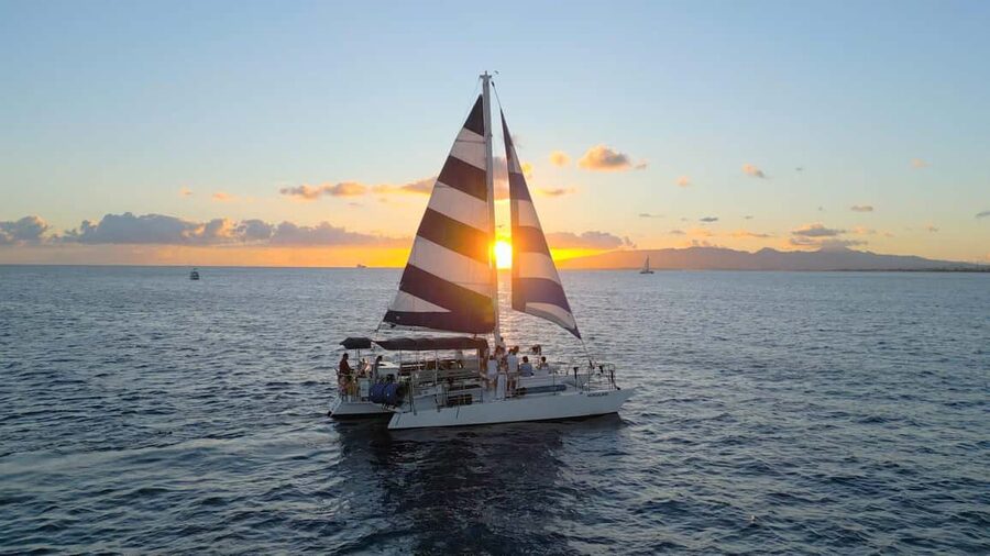 Waikiki: Sunset Swim & Sailing Experience - Sailing into the Pacific sunset